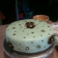 Greens And Browns Chocolate cake with twinkie filling, green buttercream fondant, chocolate gumpaste flowers