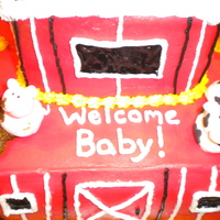 Barnyard Baby Shower Cake Chocolate cake with chocolate mousse filling, red buttercream icing, gumpaste farm animals