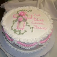 Emma's Baptism 12" cake iced and decorated in buttercream. The edge of the cross looked like crochet. To achieve the look I piped a triangle of dots...