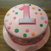 1St Birthday Cake This cake was made to match the party invitations.I used the yellow sponge cake recipe and filled it with jam and homemade buttercream.