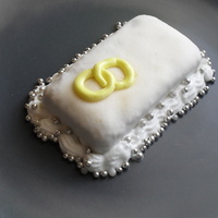 Mini Wedding Anniversary Cake i was practicing with th mmf and the royal icing paste so i made this little cake :P just to see what i could do..