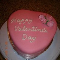 Valentine's Day Cake With Gum Paste Roses Snickerdoodle cake filled with cinnamon flavored buttercream, covered with mmf fondant. Roses are made of gum paste.