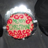 Christmas Cake This is a cake I made for my families Christmas celebration. Decorated with Buttercream. Dont mind the shoes, I had to transport three cake...