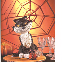 Cat And Mouse On Halloween Trick or Treat, says the board mouse