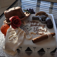 "the Godfather" Birthday Cake I made this cake for a friend who loves The Godfather. Everything on the cake is edible. The cake itself is a 12" square chocolate...