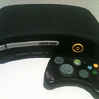 X-Box 360 Birthday Cake Cake has Fondant covering and decor. Small size cake 12" square.