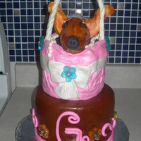 Chihuahua Cake This is a cake I made for a 6 year old's party. I had a hard time with the dog! I really wished I had an airbrush painter.