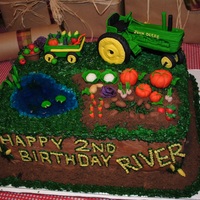 Tractor Cake! I made this tractor cake modeled after a similiar one I saw online for my son's 2 year old birthday. I added a jello pond complete...