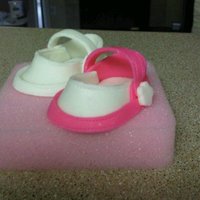 Baby Shoes Using the template on cake central I made these little baby shoes. Not too shabby for my first ones.