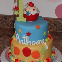 "anthony" Cake Vanilla Sour Cream Cake with Chocolate filling. Very fun, bright, unique cake for a 1st birthday party!