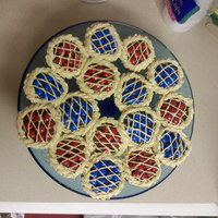 Pie Cupcakes Pie cupcakes.. these were chocolate and vanilla marble with red and blue m&m's on top.