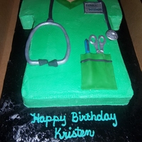 Nurses Birthday Cake vanilla cake with buttercream filling and frosting fondant/ gumpaste pocket, scissors, pen, stethoscope and name tag.