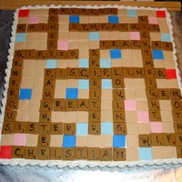 Scrabble Themed Cake This was made for a Scrabble game lover. Individual tiles made of fondant, letters written with edible marker.