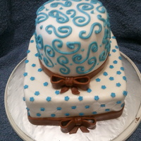 Brown And Blue I wanted to practice some techniques for an upcoming wedding cake, and a friend graciously agreed to take it off my hands (I want to lose...