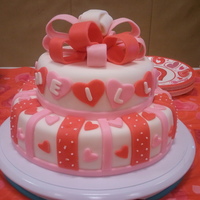 Valentines Baby Shower This cake was a lot of fun. It is a yellow cake with a strawberry frosting and filling covered in fondant. I was very pleased with how this...