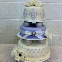 Special Occasion Cake For my niece who turned 8. Darn Good Chocolate cake w/cookies & cream filling covered in MMF. Gum Paste flowers, buttercream stenciling...