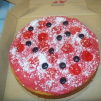 "pizza Cake" yellow cake, fruit roll ups (pepperoni), white chocolate (grated)(parmesan cheese), icing (tinted red)