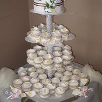 Cala Lililes Wedding cake and cupcakes for a friend, fondant, cala lilies were made from fumpaste