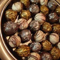 Precious Metal Cake Truffles Each bite is sinfully delicious! These truffles are cake balls taken to the ultimate level of luxury. Ginger Gold: Homemade gingerbread...