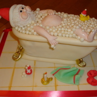 Spa Time For Santa! After seeing a similar cake on CC, I had to give it a try! The tub is a chocolate cake with homemade buttercream and MMF. This little cake...