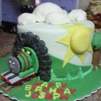 Jacob's 6Th Birthday! My friend's son LOVES the Thomas the Train cartoon, and Percy is his favorite. I combined ideas from several cakes to get this one, so...