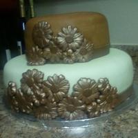 Mr. And Mrs. Zuniga's Birthday Cake They had a joint color-themed birthday party. Vanilla almond cake, chocolate buttercream, marshmallow fondant, and chocolate fondant...