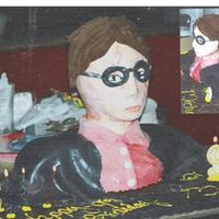 Harry Potter Bust another along the lines of the spiderman cake. except that i used mmf for the covering and bc for the hair and wand( its hard to see but on...