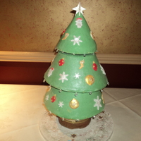 3D Christmas Sponge Cake This cake stand approx 60cms high and is my first attempt, which i am over the moon with. It has been baked and assembled in four sections...
