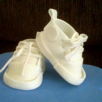 Sneakers I tried out these gum paste sneakers last night, I used the template by stellastarchild, Thanks for the great template. next time I'll...