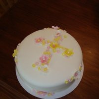 Flower Cross Choc cake, bc, and covered in mmf with gumpaste flowers with pearl dust. Inspired by another beautiful CC cake! It was for a little girls...