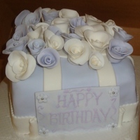Dozen Roses Birthday/mothers Day Cake Made to order cake for a wife's birthday/mothers day. Fondant roses handmade and I wasn't able to place all the roses on the cake...