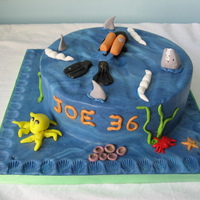 Diver diver, octopus, crab and sharks made with sugarpaste and gum