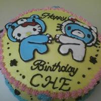 Helo Kitty Gloomy Bear RI of Kello Kitty and Gloomy Bear on a vanilla cake with almond buttercream frosting.