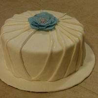 Pleats And Fantasy Flower Playing around with the pleats from keeponcaking.com Thanks!! Also first fantasy flower. Cake was snickerdoodle with cream cheese filling....