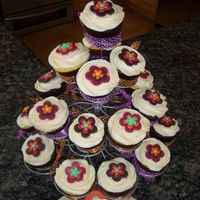 Retro Funky Flowers Baby Shower Cupcakes Retro baby shower cupcakes. I made 44 of these to match the baby shower theme (the plate is at the bottom of the picture). Half are lemon,...