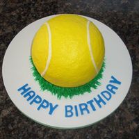 Tennis Ball Cake Tennis ball cake for my co-worker. Darn Good Chocolate Cake with chocolate filling. Buttercream icing and grass. Fondant letters.