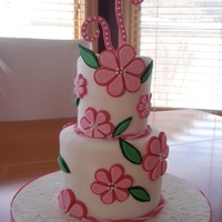 Birthday Cake For My Grandma This is a 4" and a 6" cake. The top is a lemon cake with lemon buttercream and the bottom is a spiced pound cake with a cream...