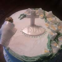 Baptism Cake Everything is edible except the toothpick holding up the cross. Decorations are made out of white chocolate clay and butter cream, smoothed...