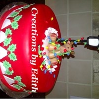 Rudolph With Christmas Lights Christmas cake covered with fondant and gum paste rudolph and light post