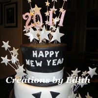 Celebrating The New Year! This cake was covered in fondant, I used our Creations by Edith star cutter set, our numbers cutter and our small letters set.