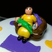 Grandma Holding Baby Carrot cake with cream cheese filling, fondant.