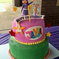 Princess Dora And Boots Made this for my niece's 2nd birthday party. She loves dora! First time I have ever done ALL buttercream. Dora ,Boots Stars and...