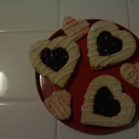 Vday Cookies raspberry jam filled sugar cookies with white chocolate drizzle