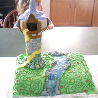 Tangled Birthday This cake was a chocolate cake. the tower was made from rice crispy treats, and the waterfall was done with piping gel.