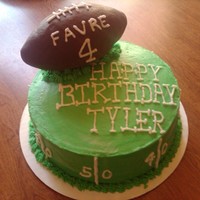 Football Birthday Cake The football is made of rice crispies and covered in chocolate.