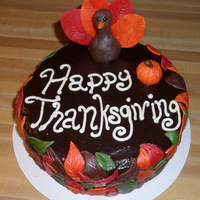 Thanksgiving Cake Chocolate ganache cake covered with modeling chocolate leaves