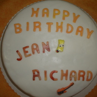 Birthday Cake Birthday chocolate cake done for 2 guys at work one is a fan of Bart Simpson and the other of music!