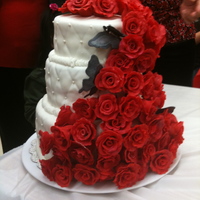 Roses Galore this cake is all edible this is my first attempt making a 3tier cake and it was very successful because everybody loved it. the cake is...