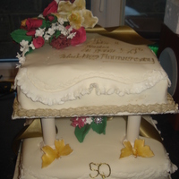 50Th Wedding Anniversary im very much the amature, but enjoy learning. did this cake for my parents 50th wedding anniversary