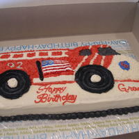 Fire Truck Birthday Cake Used regular wilton firetruck cake pan. The flag is is RI trying to make it look like the fire truck they went and visited for the party